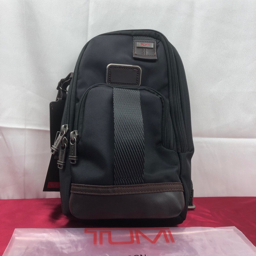 TU.MI SLING BAG In black
